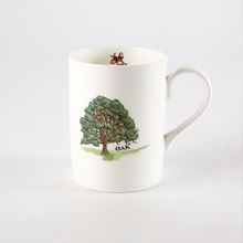 White mug with oak tree picture and oak tree description